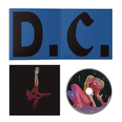 Blue 'D.C.' CD insert, print with red distorted graphic, and CD with a neon artwork. 