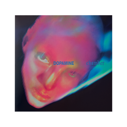 Album cover for 'Dopamine Chamber' featuring a distorted, colorful neon portrait of a face on a dark background.